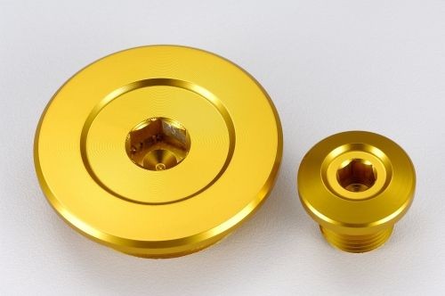 Tapon motor amarillo Suzuki